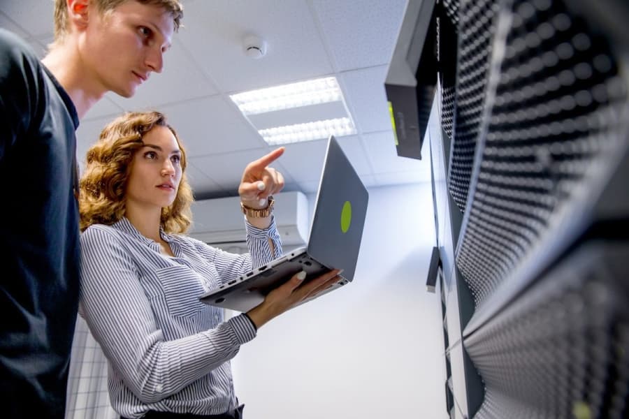 Two team member checking Private cloud servers