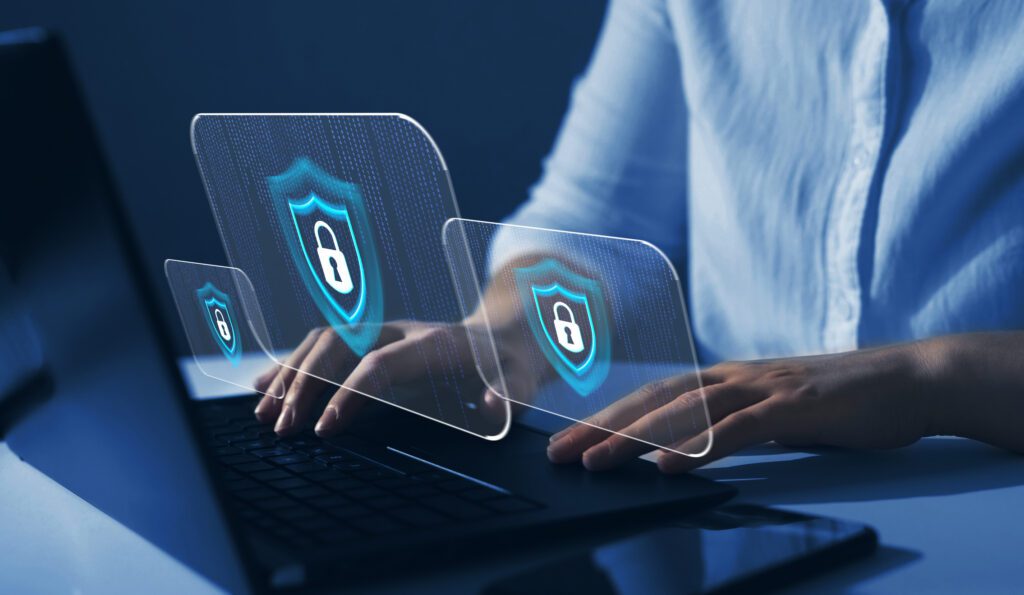 SOC 2 image of man on laptop with security